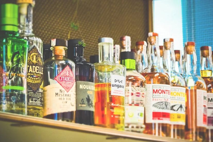 alcoholic drinks in a bottle, several bottles, different kinds of alcohol